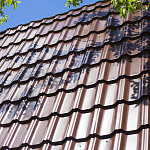 Металлочерепица Kvinta plus оцинкованная с полимерным покрытием 0,45х1210мм RAL 8017