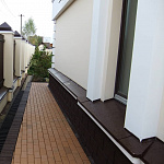 Отлив для фундамента (цокольный) оцинкованный c полимерным покрытием 0,45мм RAL 9006