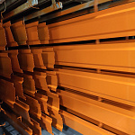 Конек фигурный 0,45 мм RAL 2000 оцинкованный, с порошковым покрытием