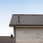 Металлочерепица Kamea оцинкованная с полимерным покрытием 0,45х1180мм RAL 1014