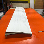 Конек фигурный 0,45 мм RAL 9010 оцинкованный, с порошковым покрытием